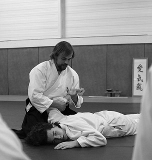 pratiquant Aïkiryu dojo tatamis